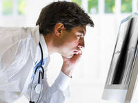 Blog Images 2022 Doctor analyzing xray tile