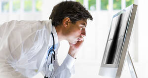 Blog Images 2022 Doctor analyzing xray tile